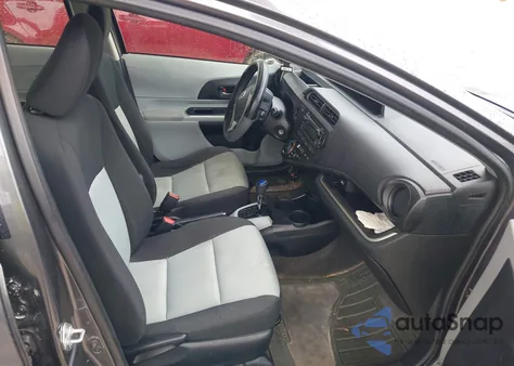 2014 Toyota Prius C z USA, uszkodzony, nr VIN JTDKDTB33E1570985